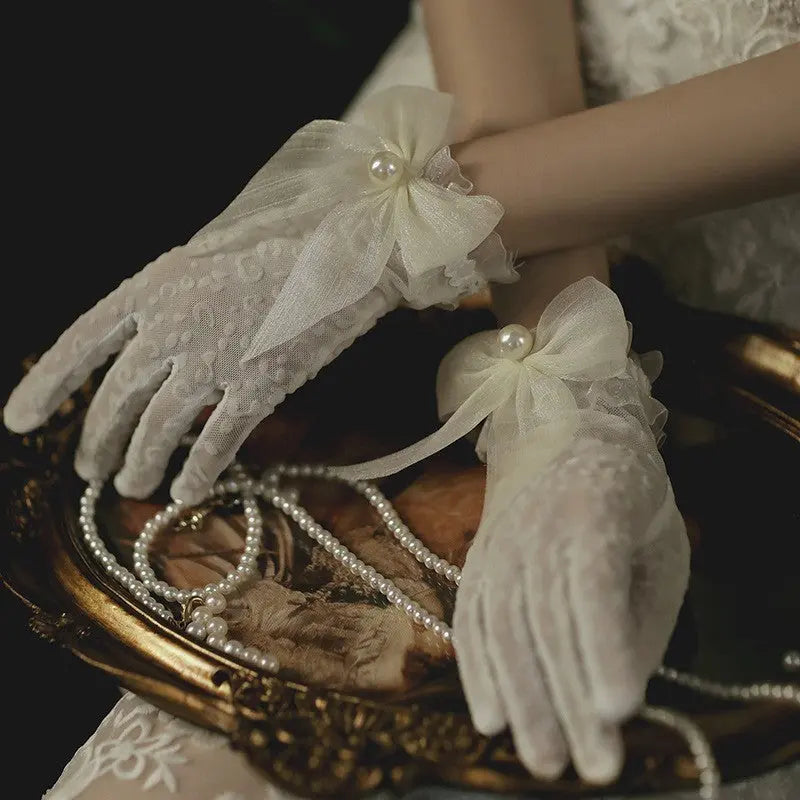 Elegant Pearl Lace Bridal Gloves with Bow Detail - Nuriyya Bridal Accessories LLC